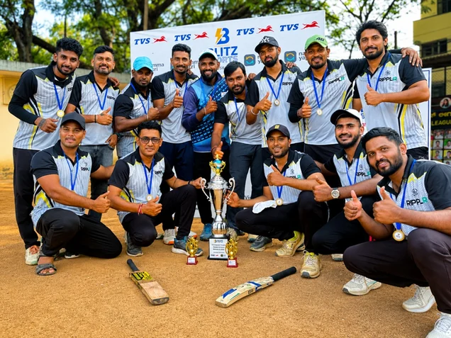 The Ripplr cricket team with their trophy after a win