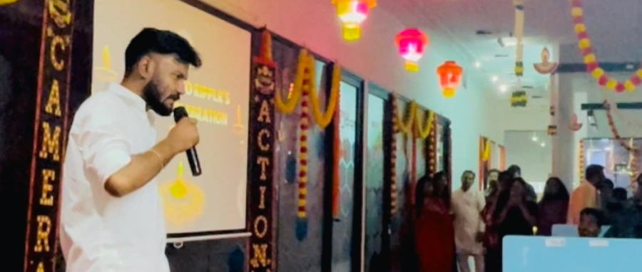 A Ripplrite speaking at a decorated office townhall
